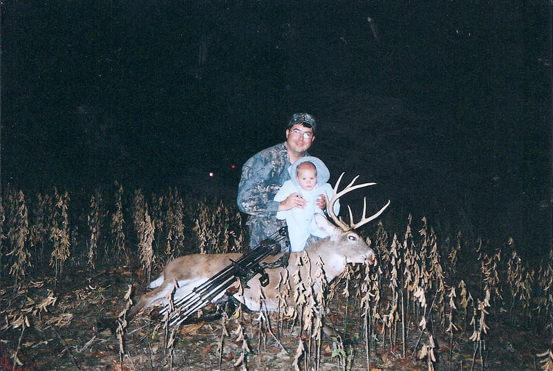 Father and Son with Trophy Buck